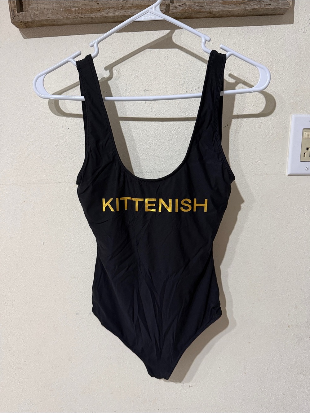 Kittenish Black One-Piece Swimsuit with Gold Logo